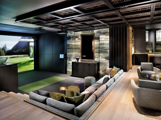 Modern design home theater with a big screen on the wall