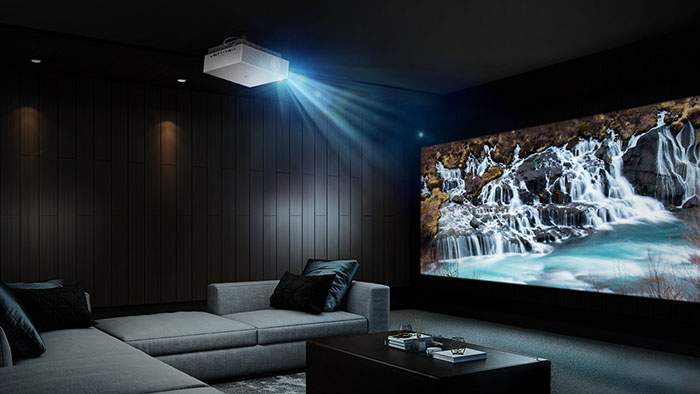 Projector and a big screen in a living room